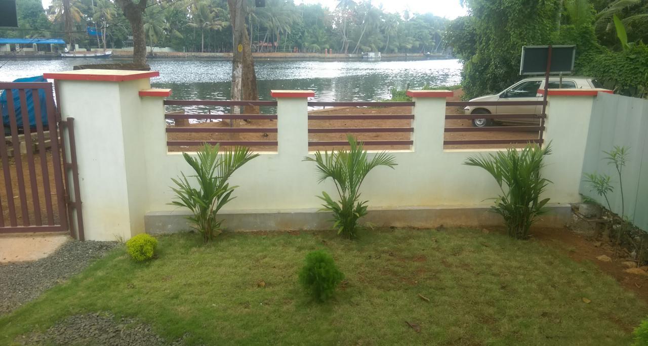 Punerjeni Homes Alappuzha Εξωτερικό φωτογραφία