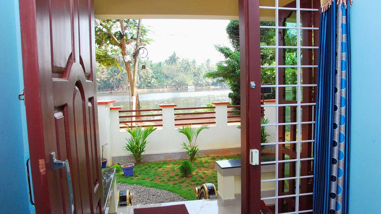 Punerjeni Homes Alappuzha Εξωτερικό φωτογραφία